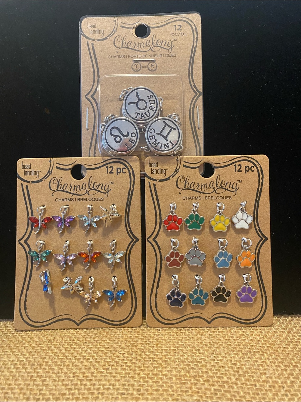 Charmalong Charms - dragonflies, paw prints and zodiac signs . Total 36 charms.